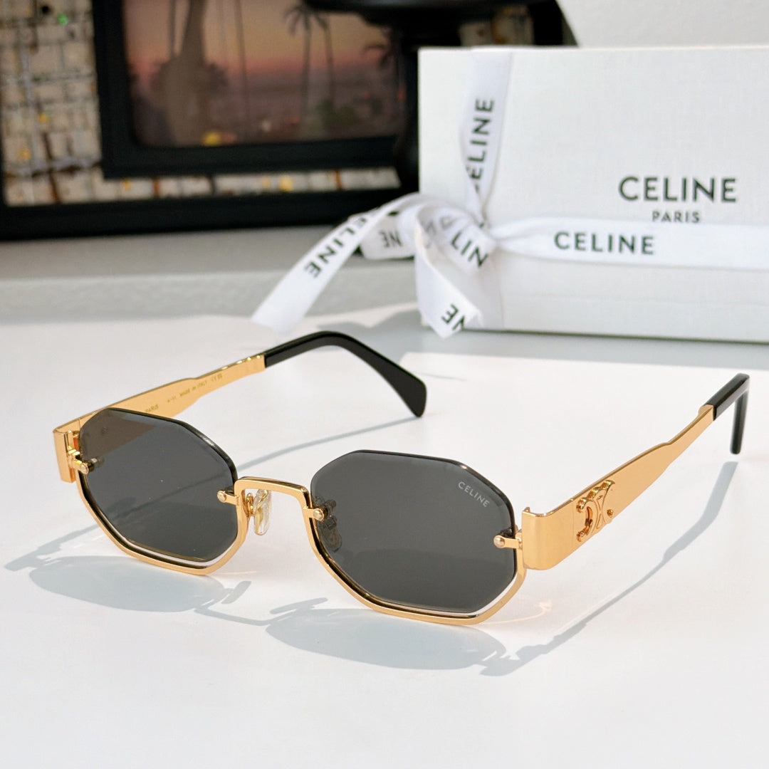 Celine octagonal sunglasses with gold frame and dark lenses, black temples
