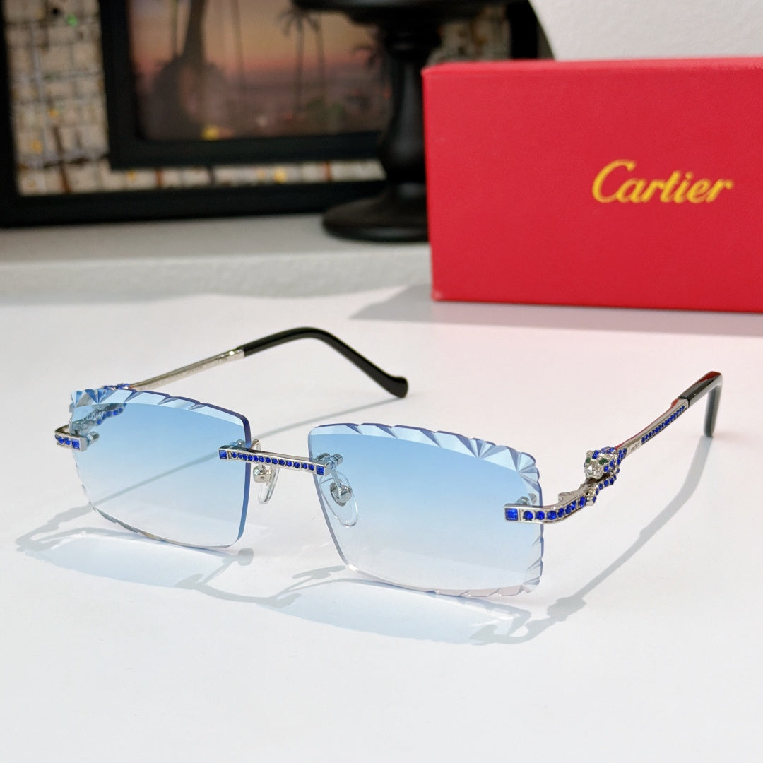 Gold sunglasses with black temples and light blue gradient lenses