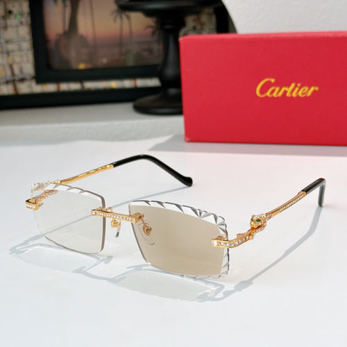 Gold metal sunglasses with black temples and clear gray gradient lenses