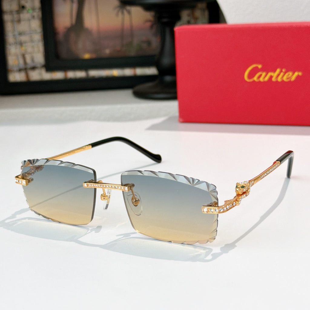 Gold sunglasses with black temples and blue-to-yellow gradient lenses