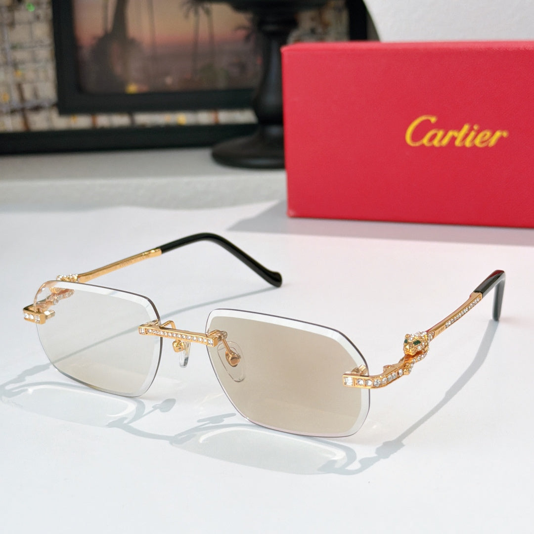 Cartier glasses with gold-tone rims, clear lenses, and black temple tips.