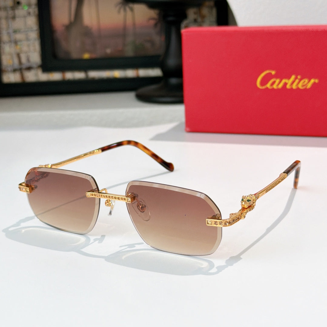 Cartier glasses with gold-tone rims, brown-tinted lenses, and patterned temple arms.