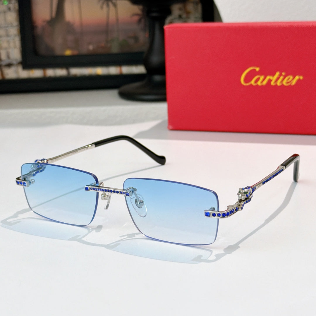 Cartier glasses with blue lenses, gold accents, rectangular frame and jeweled temple detail