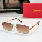 Cartier glasses with tortoise-style arms, brown-tinted lenses, rectangular frame and gold detail