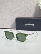 Green-tinted square eyeglasses with metal frame and clear protective lens area