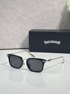 Dark-tinted square eyeglasses with black frame and silver-tone metal temple details