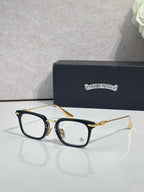 Chrome glasses with dark blue rectangular frames and clear lenses