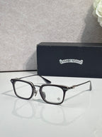 Chrome glasses with black rectangular frames and clear lenses