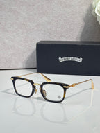 Chrome glasses with gold rectangular frames and clear lenses