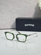 Chrome glasses with green rectangular frames and clear lenses