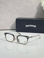 Chrome glasses with black rectangular frames and clear lenses, front view