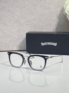 Chrome eyeglasses with dark blue frames, silver arms, and clear lenses