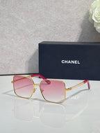 CHANEL square sunglasses with gold frames and pink gradient lenses