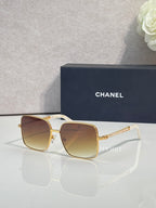 CHANEL square sunglasses with gold frames and gradient brown lenses