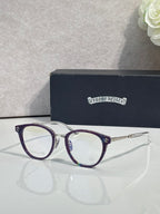 Navy round eyeglasses with purple-accent temple arms and clear lenses