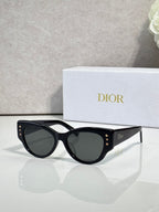 Dior black cat-eye sunglasses with dark lenses