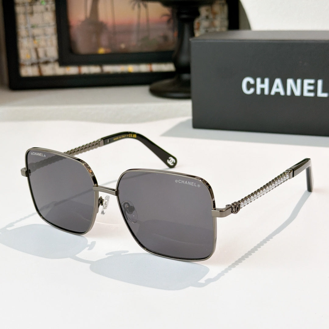 Chanel square sunglasses with silver-tone frame and dark gray gradient lenses