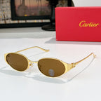 Round gold-tone sunglasses with brown-tinted lenses and metal bridge detail