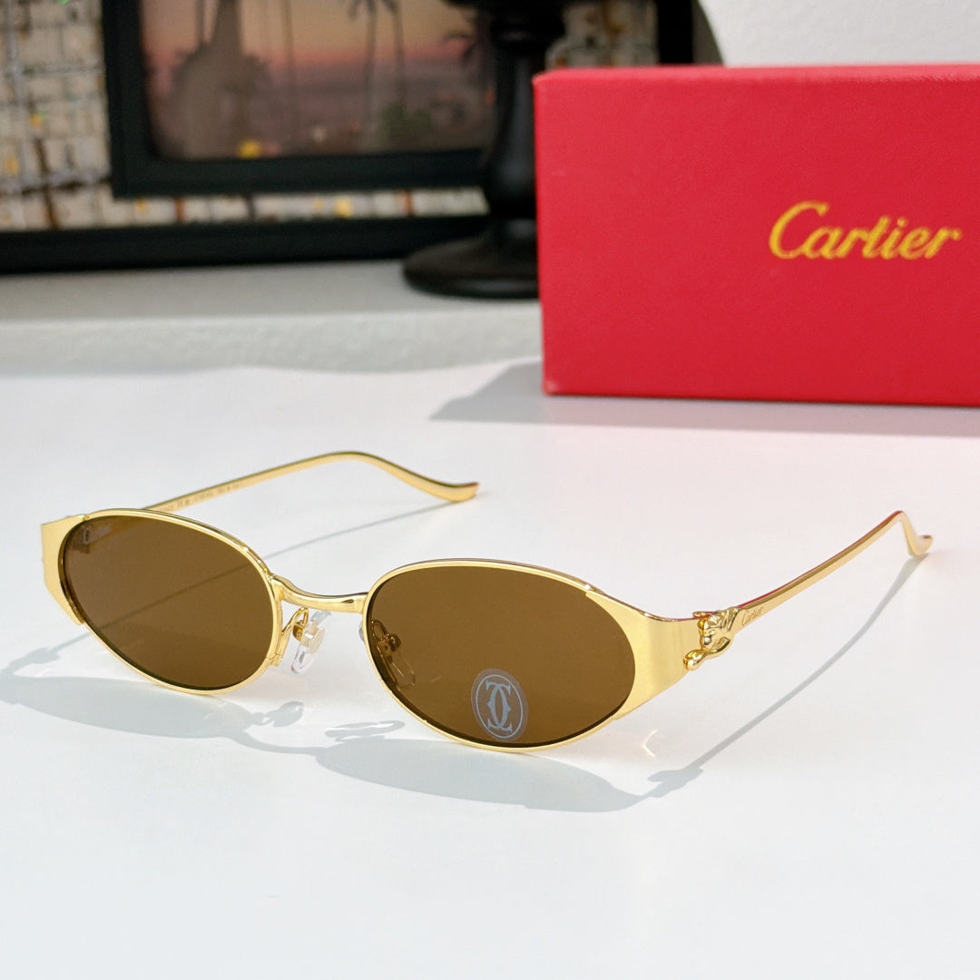 Round gold-tone sunglasses with brown-tinted lenses and metal bridge detail