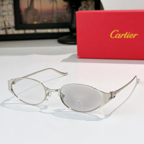 Round silver-tone sunglasses with light lenses and delicate metal bridge detail