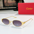 Round gold-tone sunglasses with deep lavender-tinted lenses and metal bridge detail