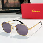 Sunglasses with gold frame, black temples, and purple tinted round lenses