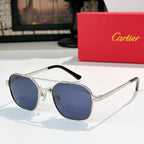 Sunglasses with silver frame, black temples, and blue tinted round lenses
