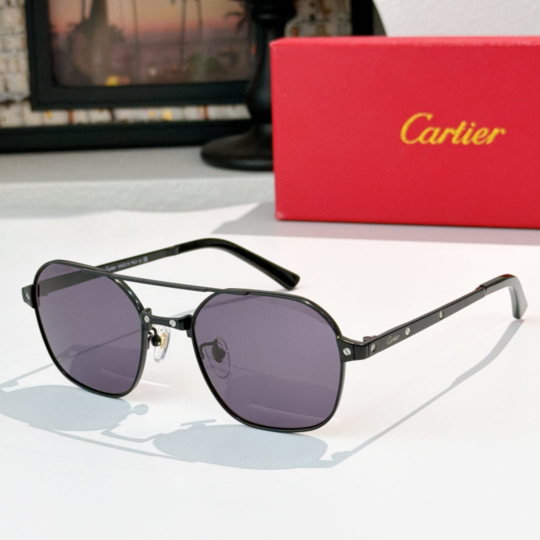 Sunglasses with dark frame, black temples, and purple tinted round lenses