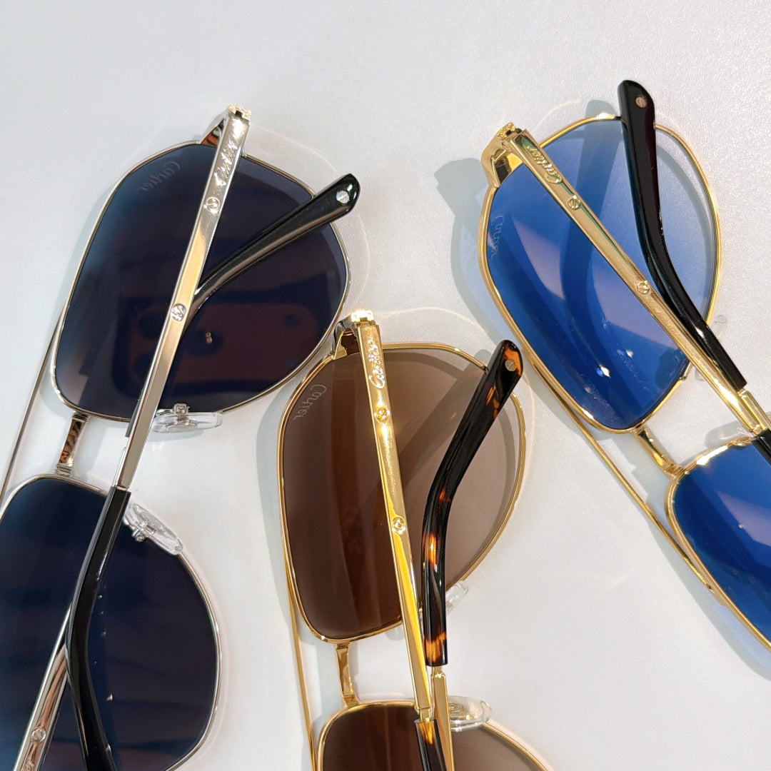 Assorted aviator sunglasses with mixed metal frames and tinted lenses