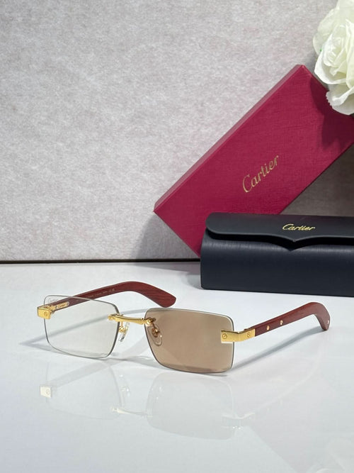 Cartier eyeglasses with dark brown frame and gold-tone hinge, clear lenses, rectangular shape