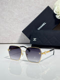 Chanel sunglasses with gold square frame and dark purple lenses, mirrored detail on arms