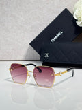 Square sunglasses with pink gradient lenses and gold-tone frames, with logo detail on temples.