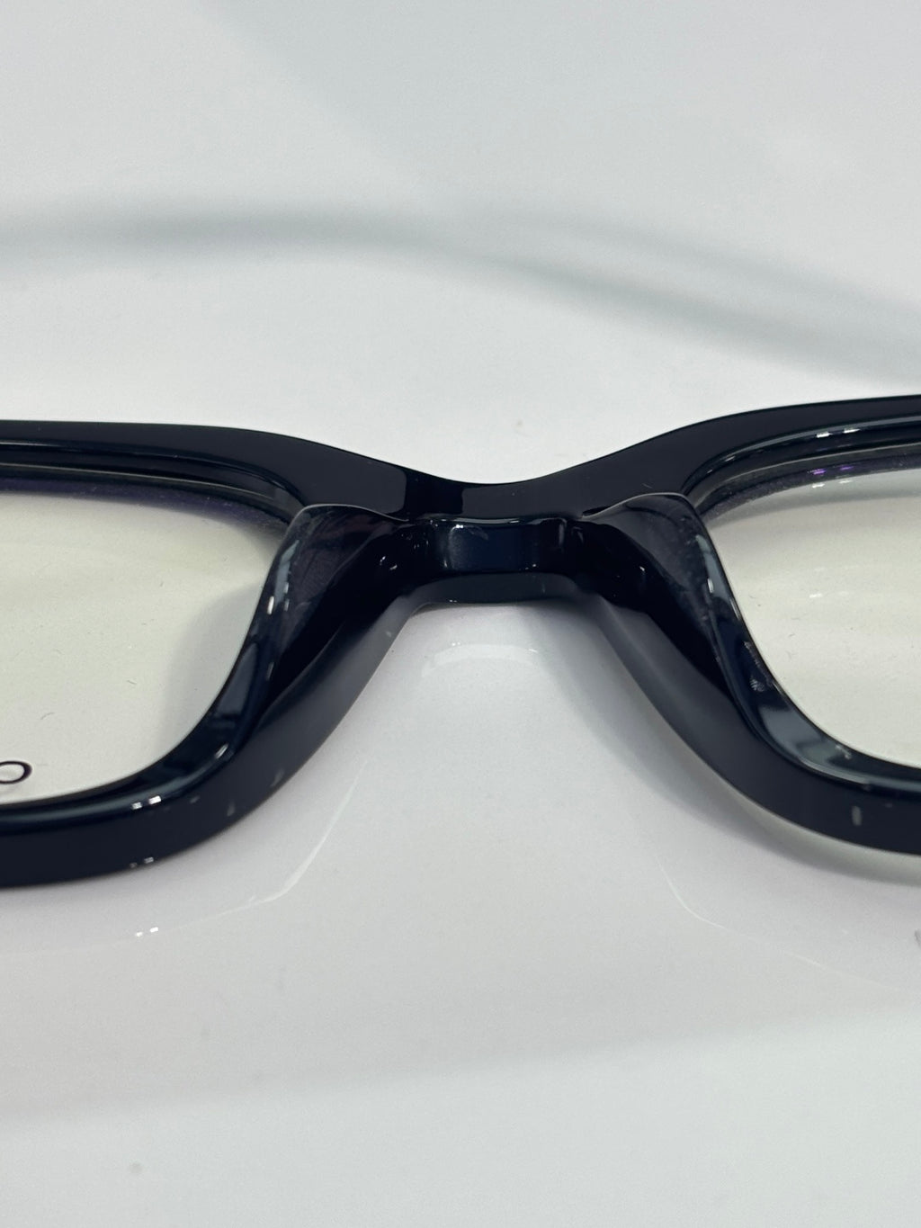 Black round eyeglasses frame close-up