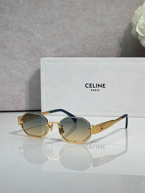Celine octagonal sunglasses with gold frame, tinted lenses, and blue temple accents