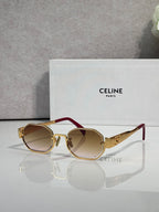 Celine glasses with gold-tone frame and burgundy temple, dark tinted lenses