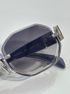 Celine glasses close-up of navy-tinted lens and silver frame