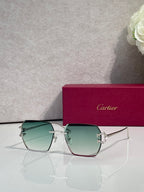 Cartier glasses with green gradient lenses and gold-tone cat-eye frame