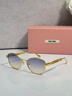 MiuMiu sunglasses, gold frame with light gradient lenses