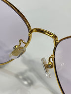 MiuMiu sunglasses, gold temple detail and crystal end piece