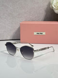 MiuMiu sunglasses, silver frame with dark lenses