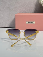 MiuMiu glasses with gold frame and purple tinted lenses