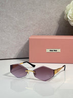 Sunglasses with black frames, gold details, purple gradient lenses