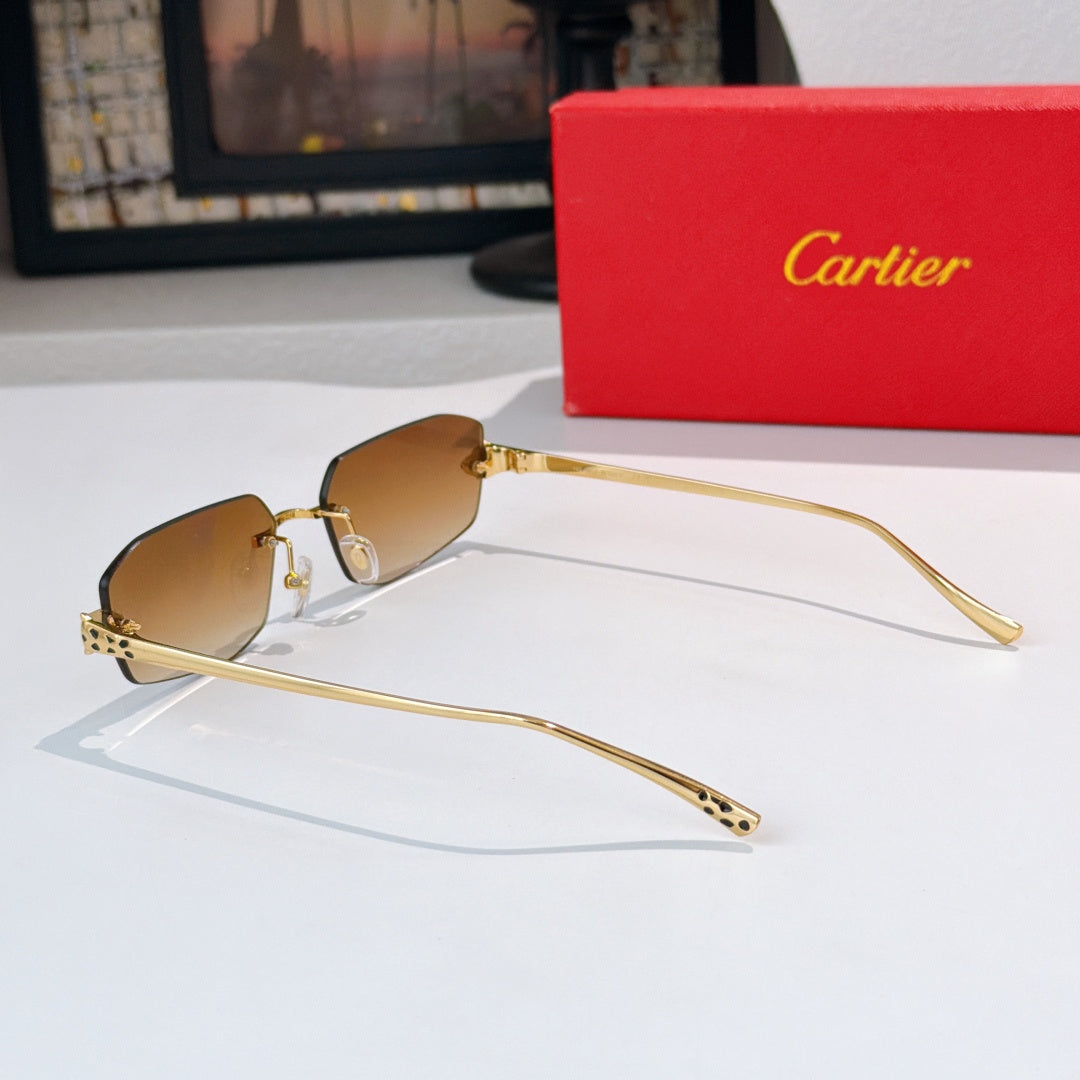 Cartier sunglasses with gold-tone frame and honey brown lenses