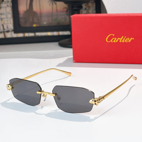 Cartier sunglasses with gold-tone frame and dark gray lenses