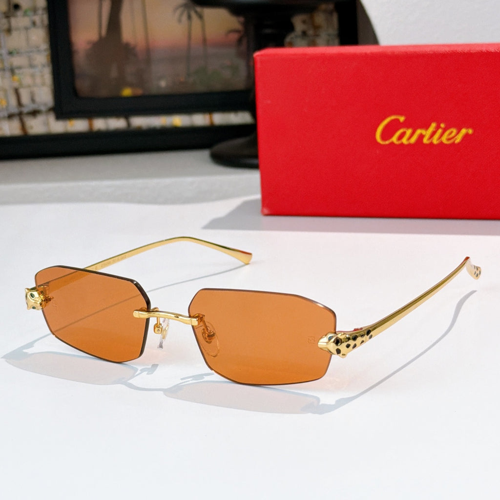 Cartier sunglasses with gold-tone frame and amber lenses