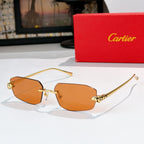 Cartier sunglasses with gold-tone frame and amber lenses