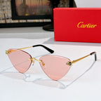 Gold-tone cat-eye glasses with soft pink tinted lenses and black temple tips