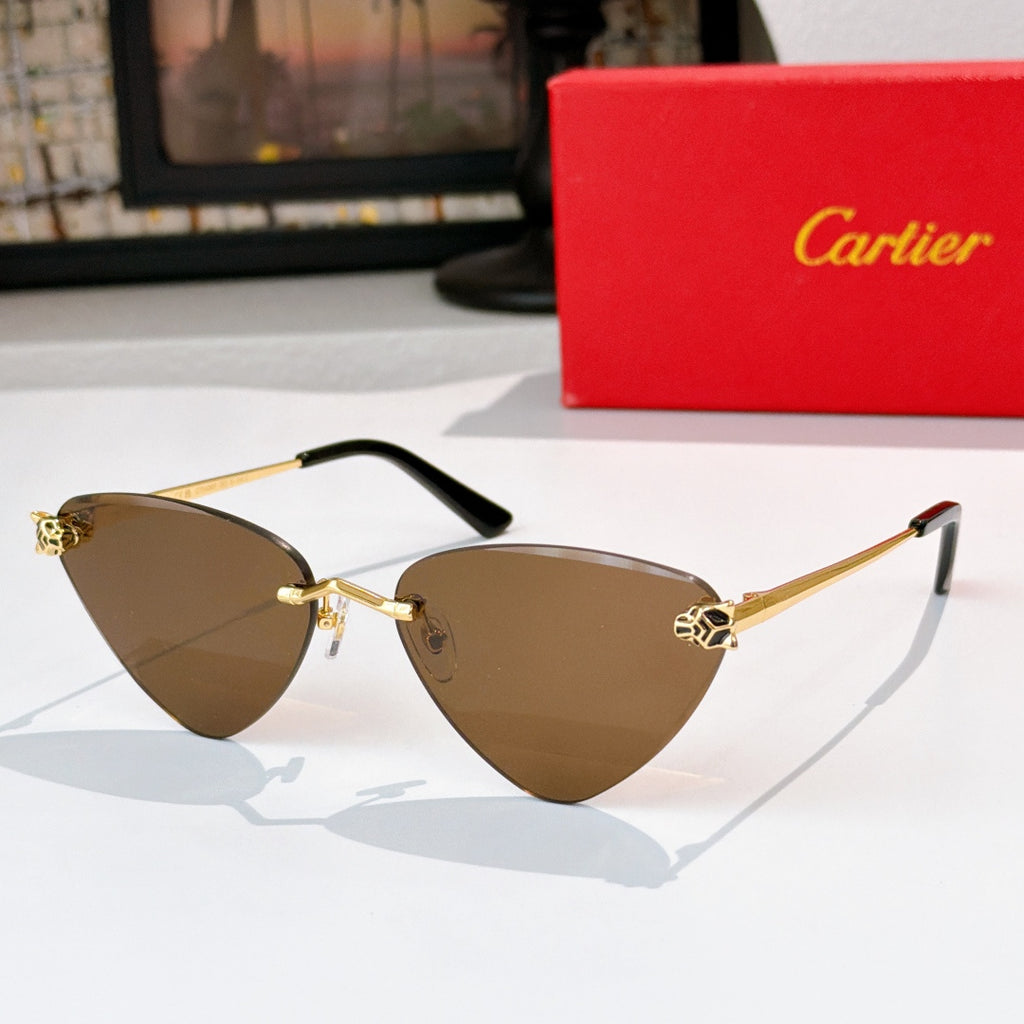 Gold-tone cat-eye glasses with brown tinted lenses and black temple tips