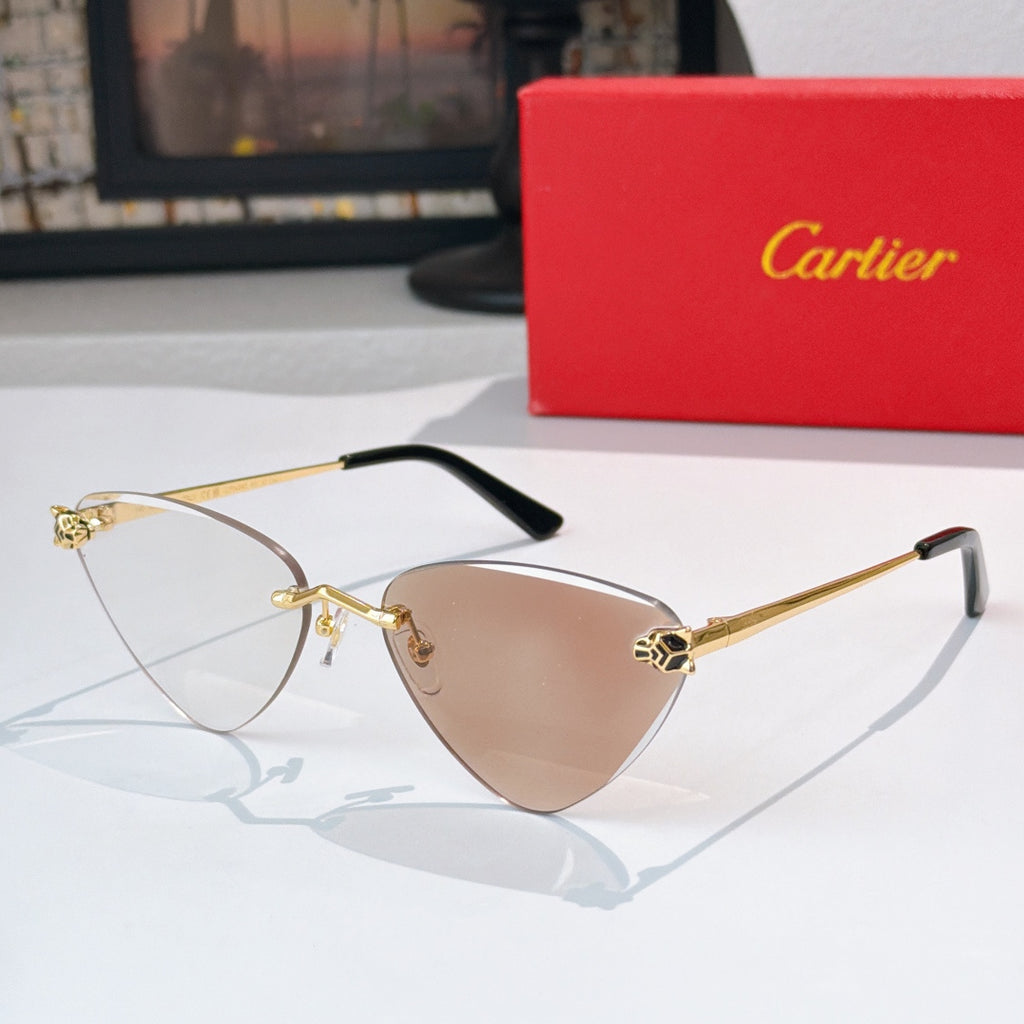 Gold-tone cat-eye glasses with tinted lenses and black temple tips