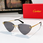 Gold-tone cat-eye glasses with dark gray tinted lenses and black temple tips